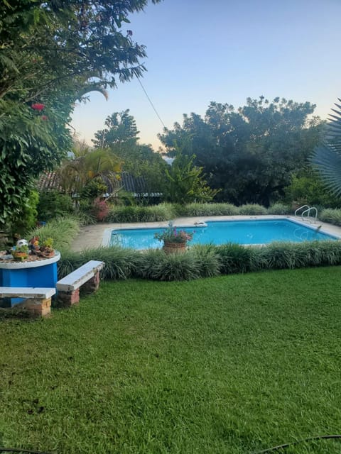 Garden, View (from property/room), Seating area, Pool view, Swimming pool