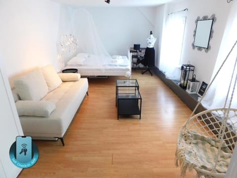 Bed, Living room, Seating area, Bedroom
