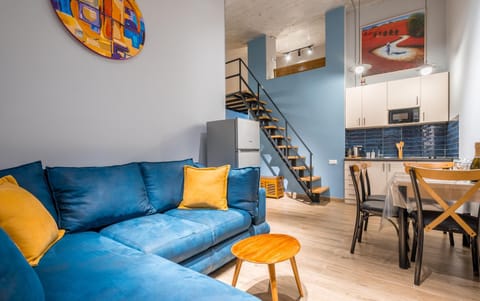 Kitchen or kitchenette, Living room, Seating area, Dining area