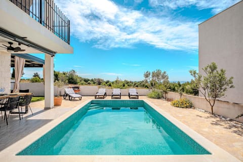 Property building, Patio, Facade/entrance, BBQ facilities, Garden, View (from property/room), Balcony/Terrace, Landmark view, Pool view, Area and facilities, Swimming pool, Entertainment