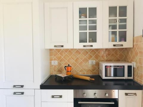 Kitchen or kitchenette, oven
