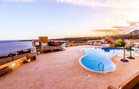 Pool view, Sea view, Swimming pool, Sunset, sunbed