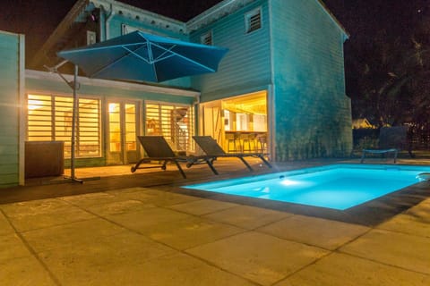 Property building, Patio, Night, Pool view, sunbed