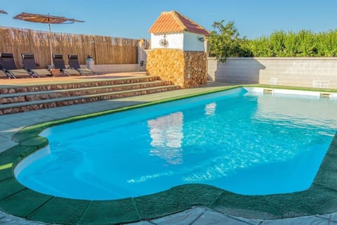 Property building, Living room, Swimming pool