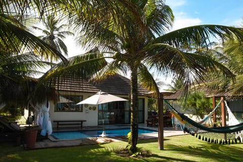 Property building, Patio, Day, Garden, Balcony/Terrace, Decorative detail, Garden view, Pool view, Swimming pool, sunbed
