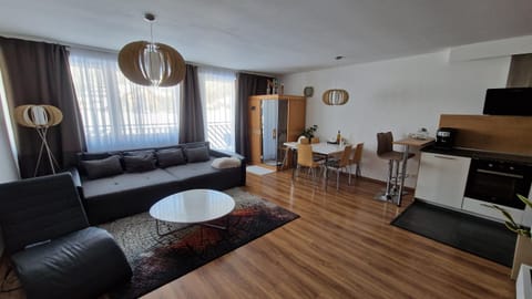 Kitchen or kitchenette, Living room, Seating area, Dining area