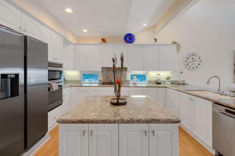 Kitchen or kitchenette, dishwasher, oven, stove