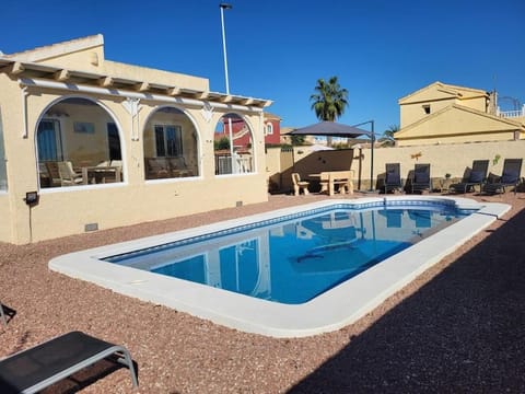 Property building, Patio, Day, Pool view, Swimming pool, sunbed
