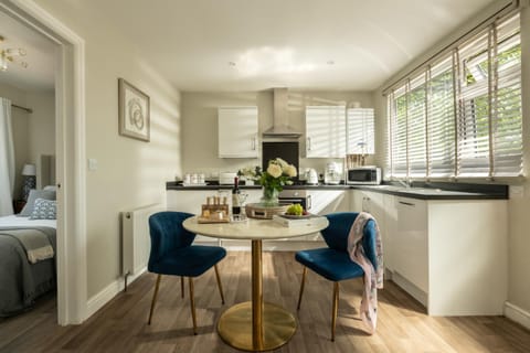 Dining area, dishwasher, microwave, oven, stove, toaster, kitchen