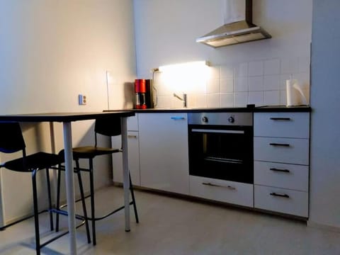 Kitchen or kitchenette, oven