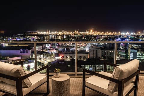 Night, View (from property/room), Balcony/Terrace, Seating area, City view, Sea view