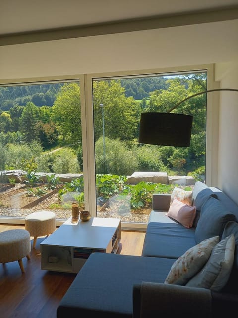 View (from property/room), Living room, Seating area, Garden view