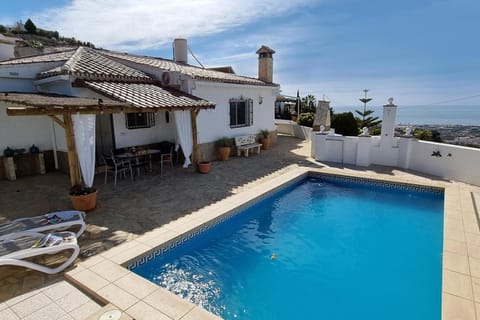 Property building, Living room, Swimming pool