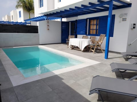Property building, Living room, Swimming pool