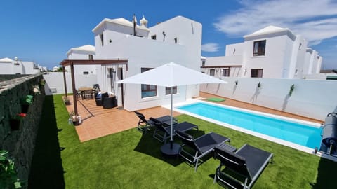 Property building, Living room, Swimming pool