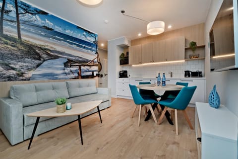 Kitchen or kitchenette, Living room, Seating area, Dining area