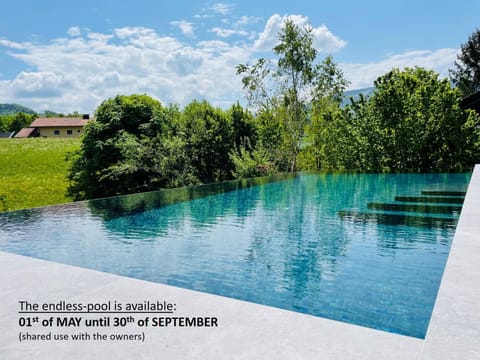 Day, Natural landscape, Text overlay, Pool view, Swimming pool, Swimming pool