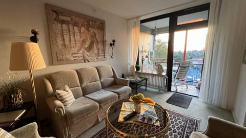 View (from property/room), Balcony/Terrace, Living room, Photo of the whole room, Decorative detail, Seating area, Family