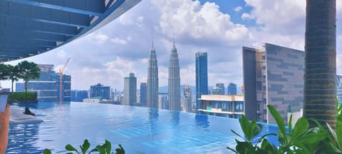 Property building, Nearby landmark, Day, City view, Pool view, Swimming pool