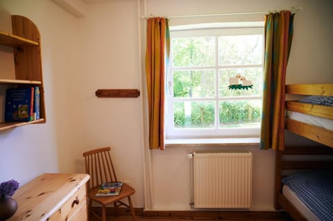 Süße Wohnung direkt am Wald rotes Haus EG Apartment in Dahme