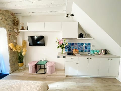 Kitchen or kitchenette, stove