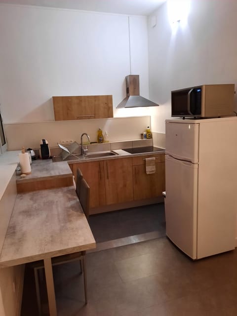 Kitchen or kitchenette, stove