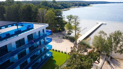 Property building, Day, Natural landscape, Beach, Lake view