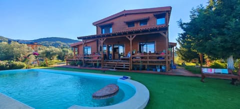 Property building, Patio, Spring, Natural landscape, Garden, Garden view, Mountain view, Pool view, Swimming pool, sunbed