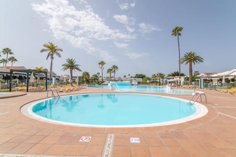Property building, Living room, Swimming pool