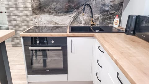 Kitchen or kitchenette, stove