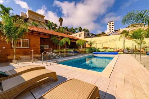 Swimming pool, sunbed