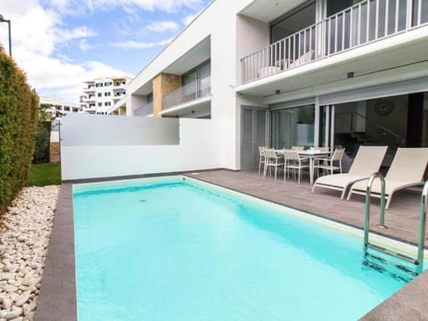 Swimming pool, sunbed