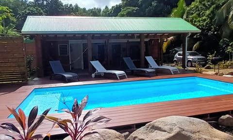 Property building, Patio, Day, Garden, Garden view, Pool view, Swimming pool, sunbed