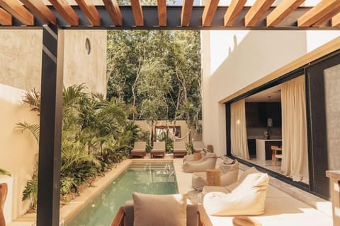 Patio, Seating area, Garden view, Pool view, sunbed