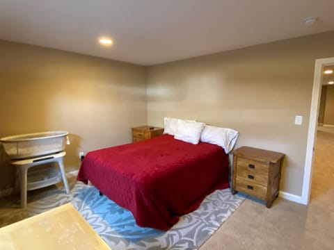 Private basement bedroom with private bathroom, kitchen, and living room with large screen television Vacation rental in Fishers