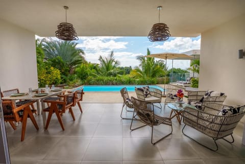 Patio, Patio, Day, View (from property/room), Balcony/Terrace, Living room, Seating area, Dining area, Pool view, Swimming pool, Swimming pool, sunbed
