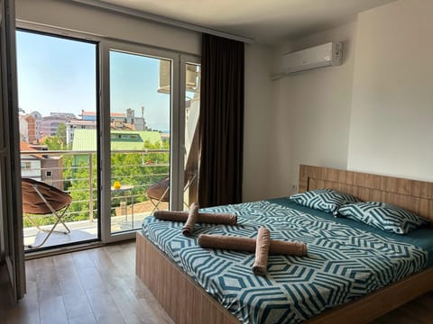 Bed, View (from property/room), Balcony/Terrace, Bedroom, towels, air conditioner