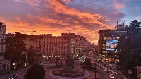Nearby landmark, View (from property/room), City view, Street view, Sunset