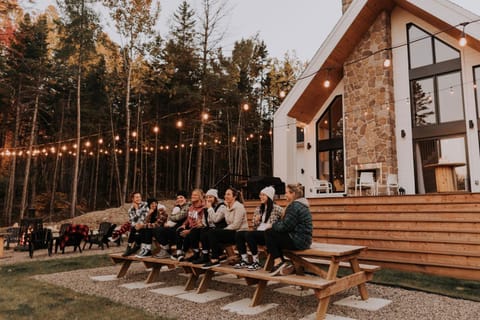 Property building, Patio, People, Natural landscape, Garden view, group of guests