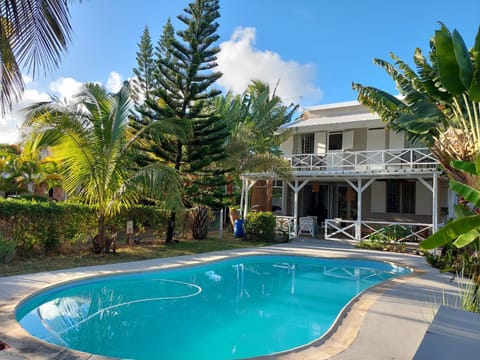 Property building, Patio, Day, Garden, Garden view, Pool view, Swimming pool