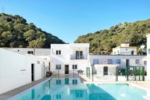Property building, Living room, Swimming pool