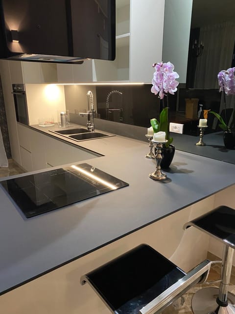 Kitchen or kitchenette, stove