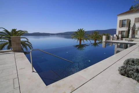 Property building, Natural landscape, Swimming pool