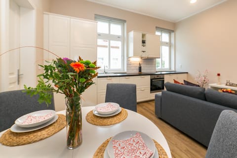 Kitchen or kitchenette, Living room, Seating area, oven, stove