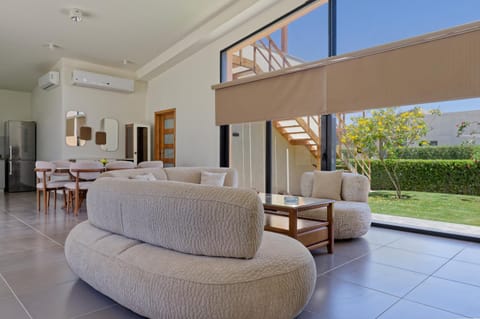 Property building, View (from property/room), Living room, Seating area, air conditioner