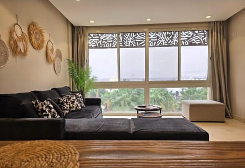 View (from property/room), View (from property/room), Living room, Seating area, City view, Lake view, Lake view
