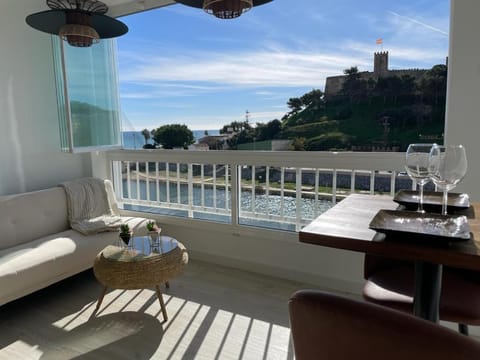 Natural landscape, View (from property/room), Balcony/Terrace, Living room, Seating area, Dining area, Sea view