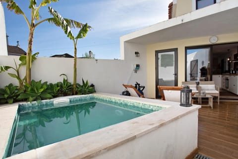 Property building, Living room, Swimming pool