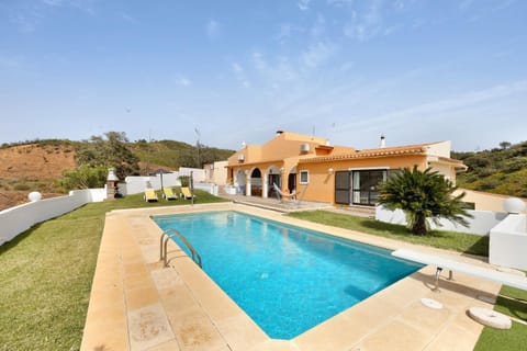 Property building, Living room, Swimming pool