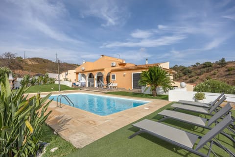 Property building, Living room, Swimming pool
